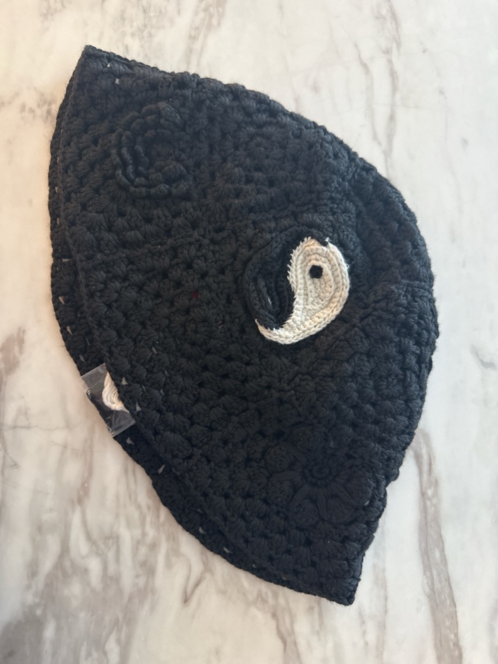 STAUD Black Crochet Bucket Hat with Yin Yang Appliqué